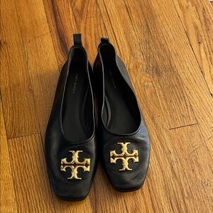 Tory Burch Black Flats with Gold Emblem
